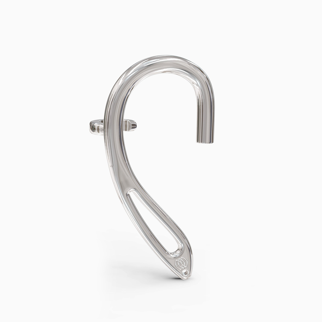 Angled image of silver ear cuff with over-ear clip for secure fit