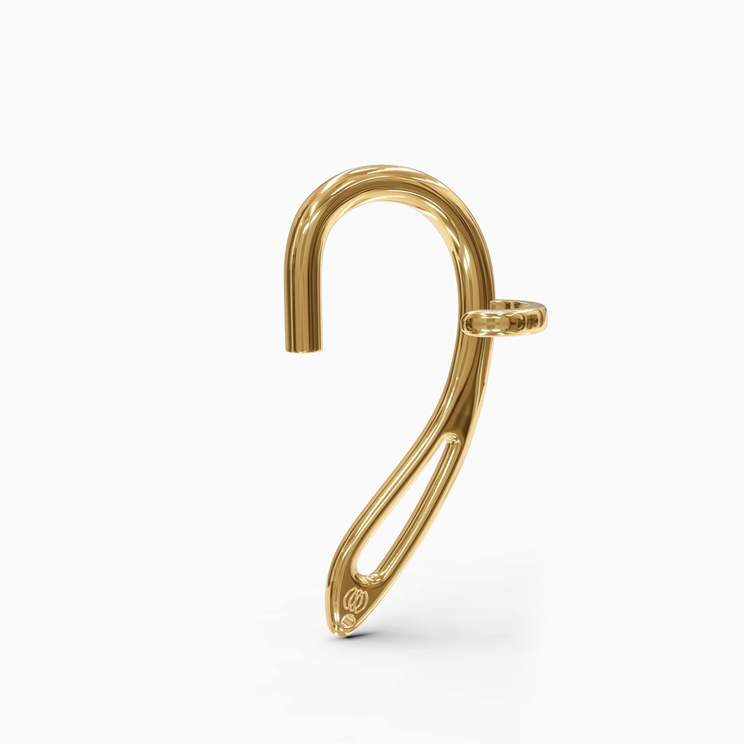  "Side profile view of the Hearcuff Jewelry 24kt yellow gold interchangeable earcuff earring, illustrating how it fits on the ear."
