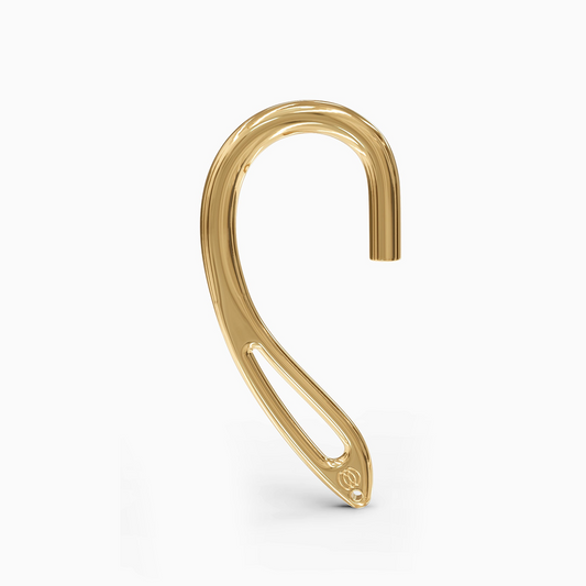 Angled shot of luxurious gold ear cuff with ergonomic AirPod clamp