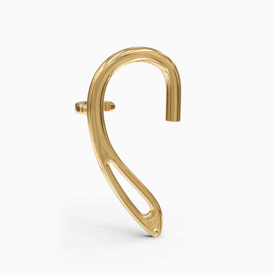 Angled image of gold side-clip cuff displaying seamless design