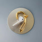 Close-up of 24 kt gold side-clip cuff craftsmanship