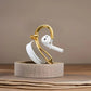 Front view of gold Elegance side-clip ear cuff for AirPod tech jewelry