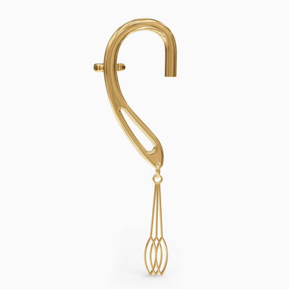 Angled image of gold side-clip dangle cuff showing pendant
