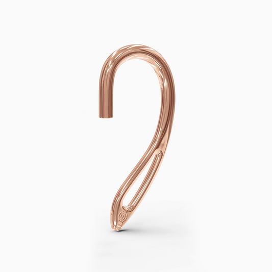Side profile of luxe rose gold ear cuff showcasing clean finish
